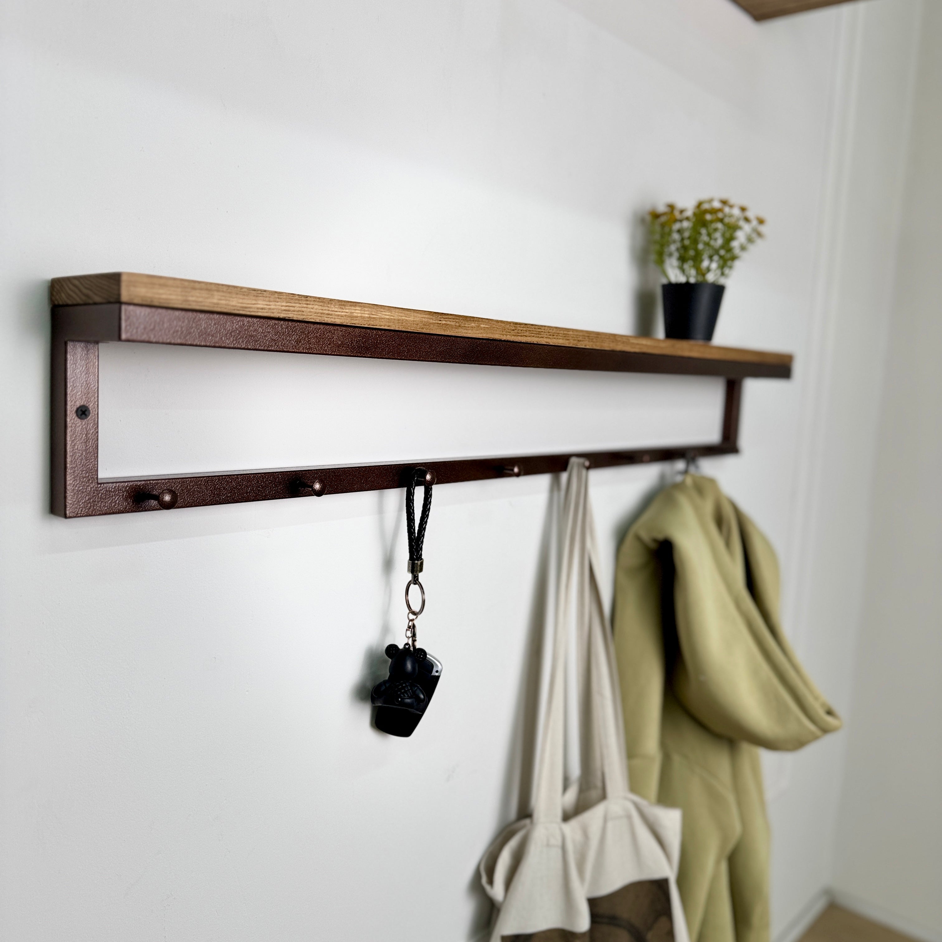 Metal coat hanger with hooks and wood shelf