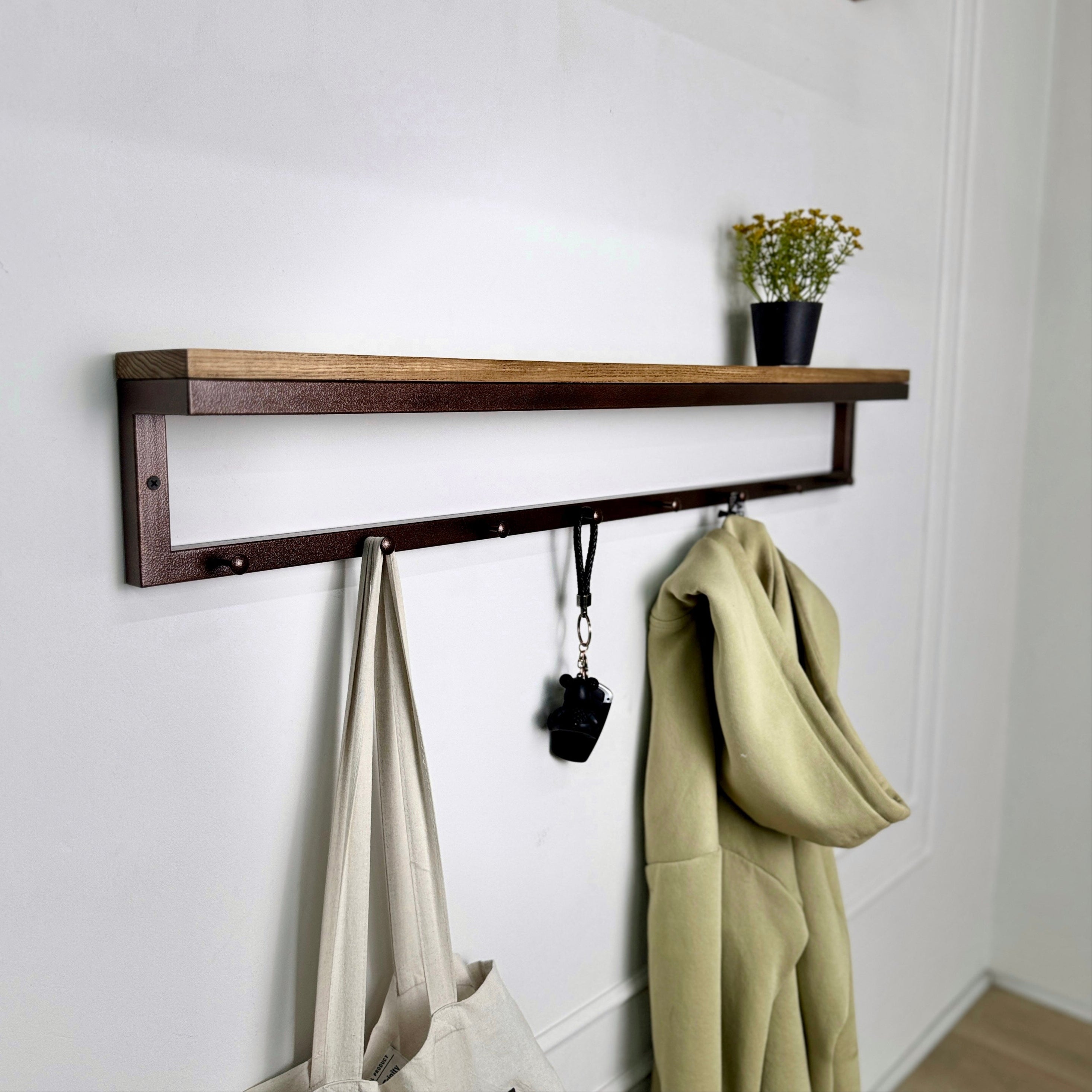 Metal coat hanger with hooks and wood shelf