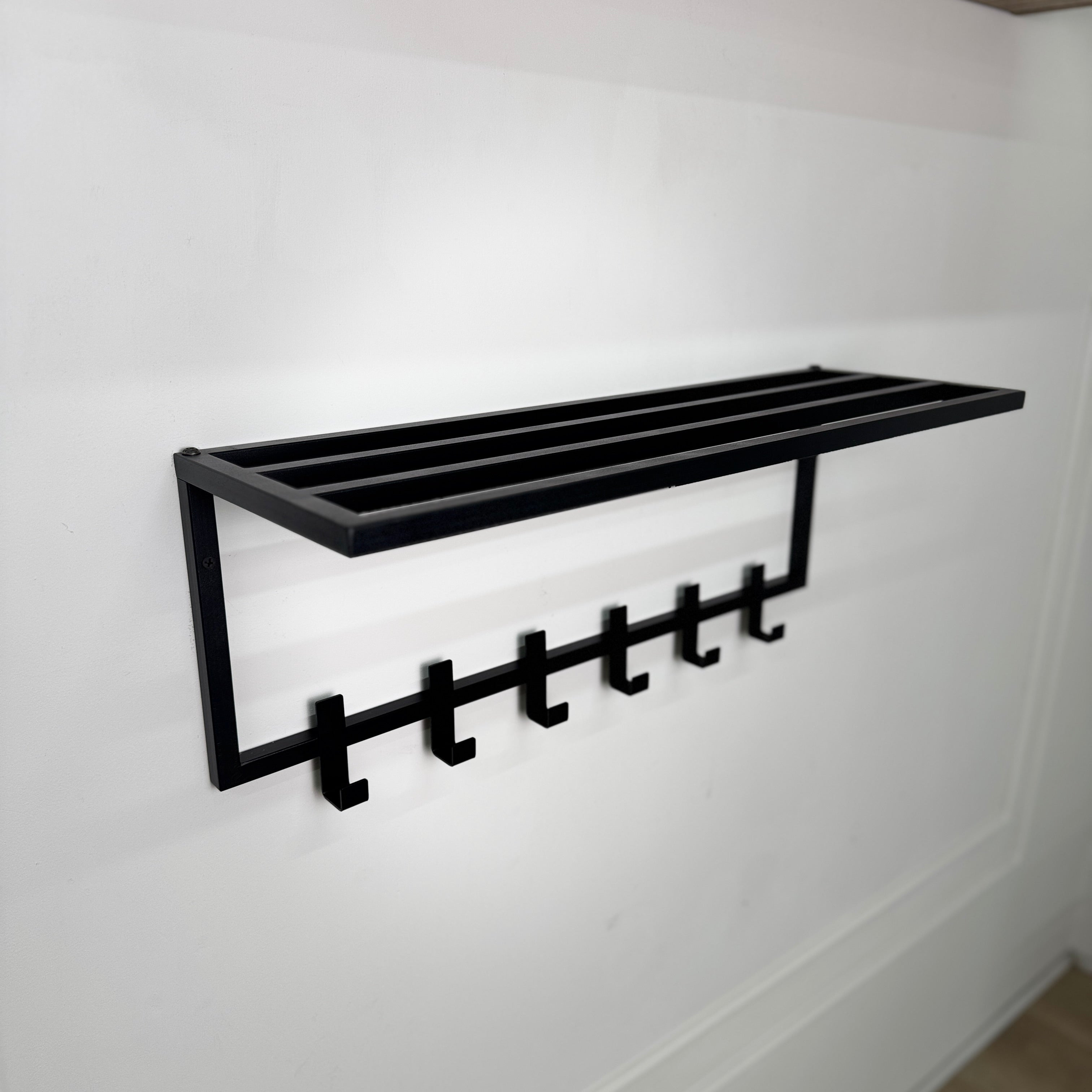 Collapsible metal coat hanger with hooks and shelf