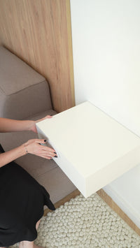 Wall-Mounted nightstand with hidden safe